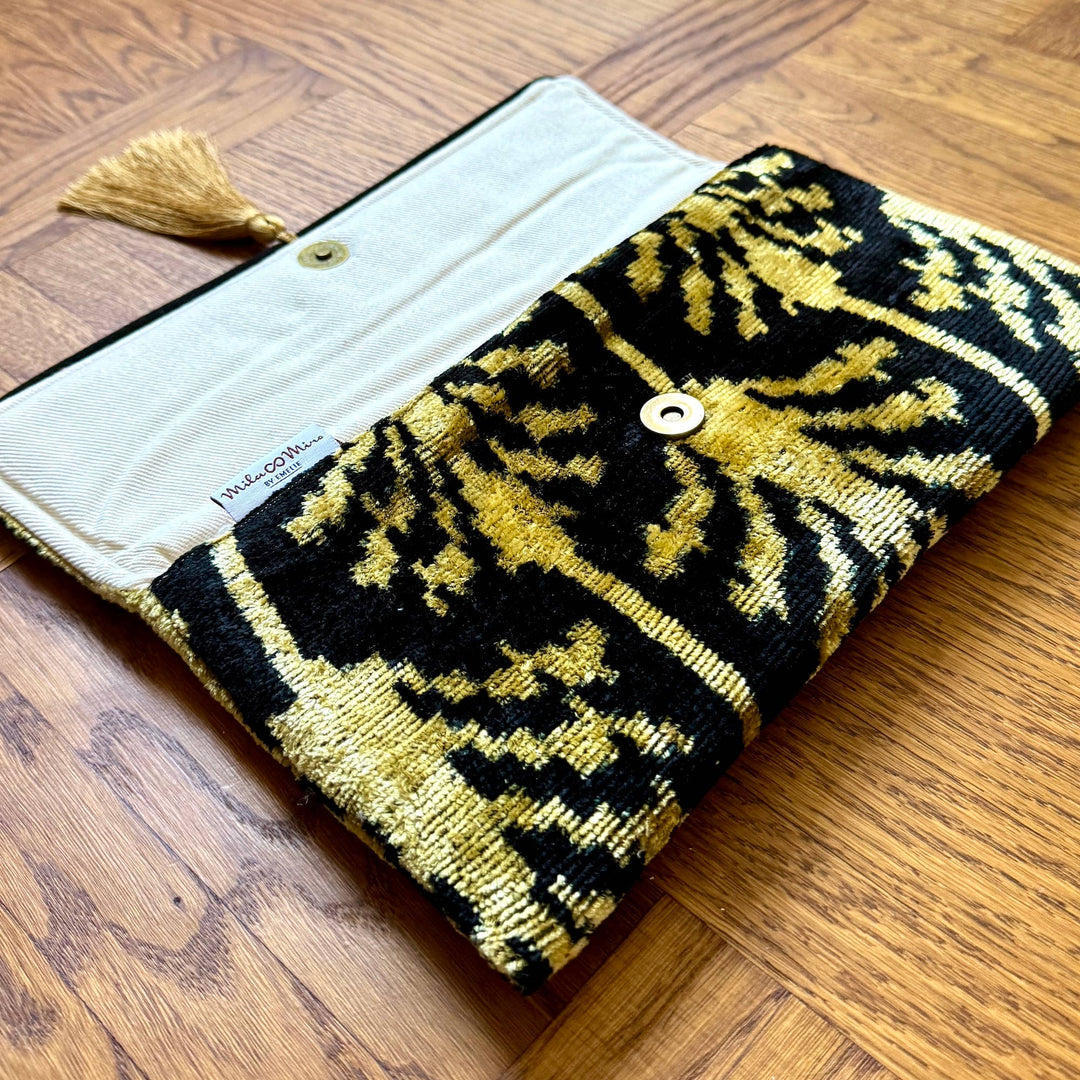 Ikat-Clutch-Tasche Cap d'Antibes mit Goldkette
