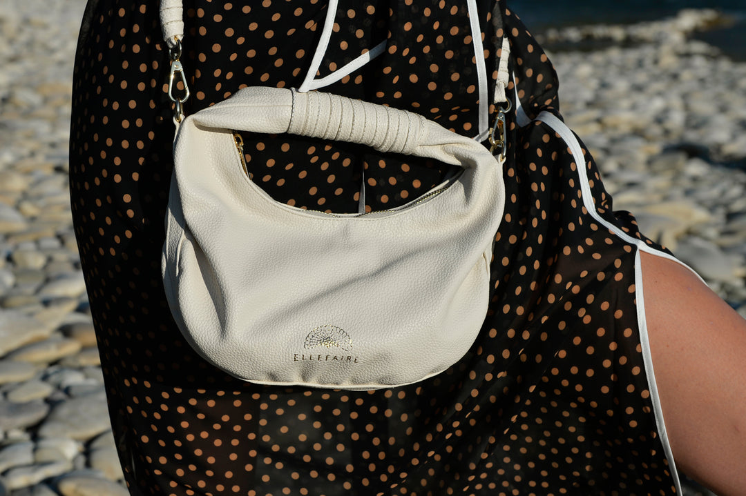 Sienna Crossbody Handtasche aus recyceltem veganem Material in Crema