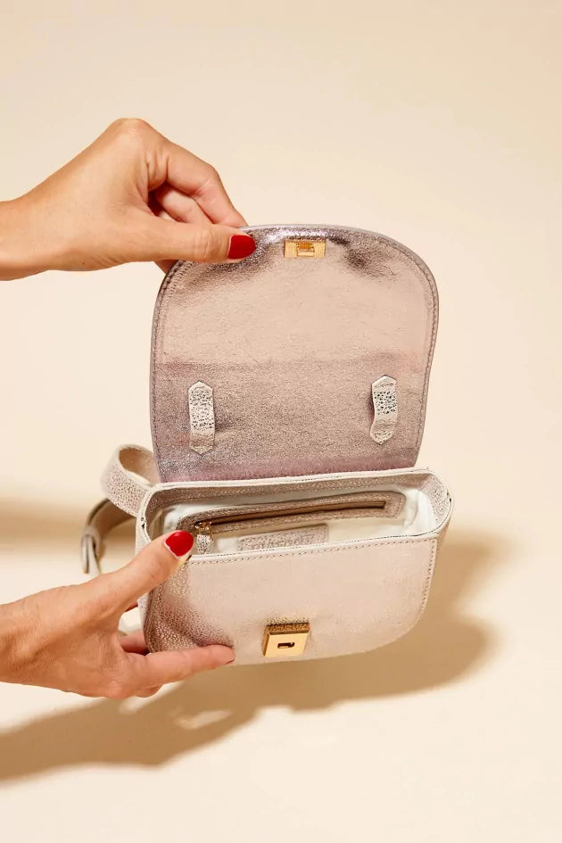 Angela Lila's metallic handbag
